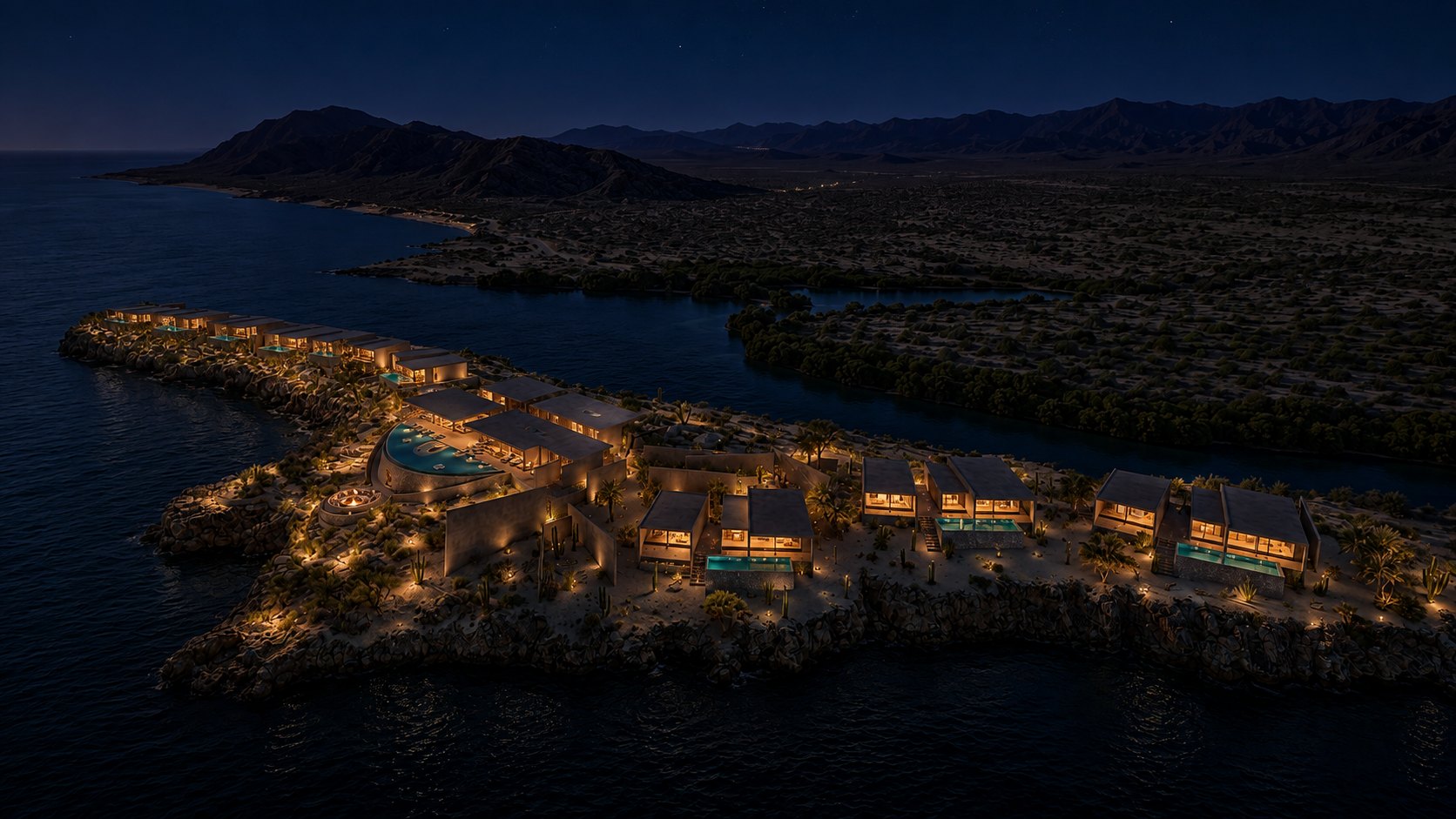El conjunto iluminado sobre la bahía, de noche